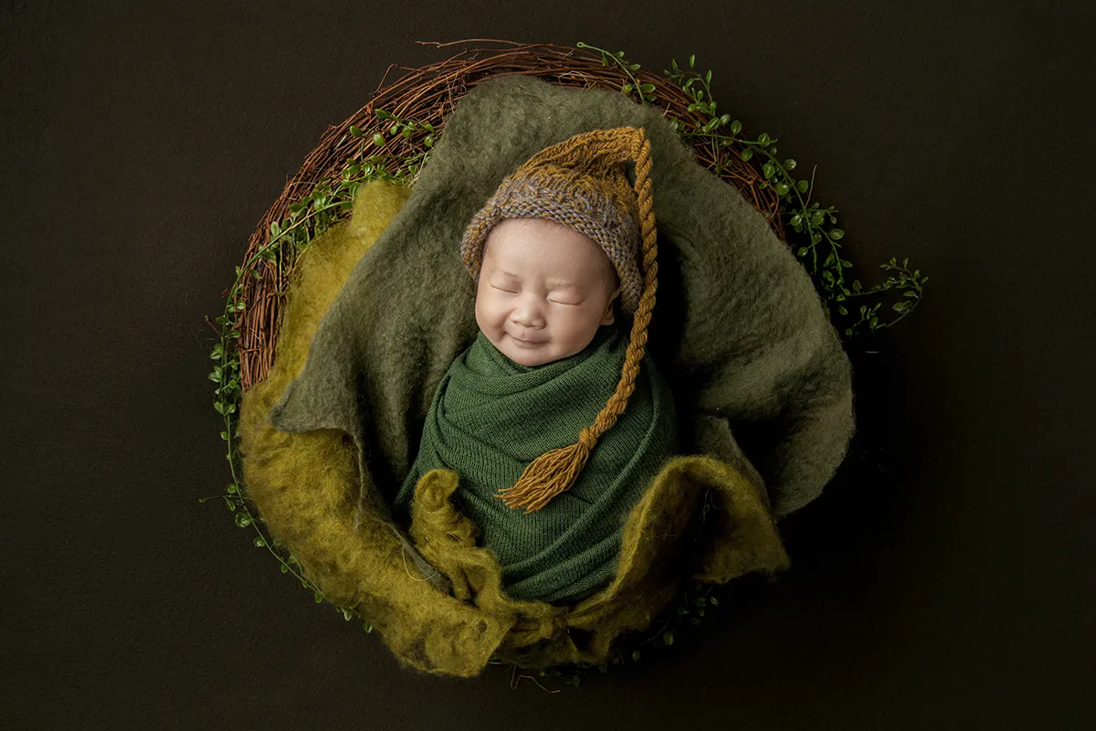 Newborn baby sleeping during newborn photography session in Auckland